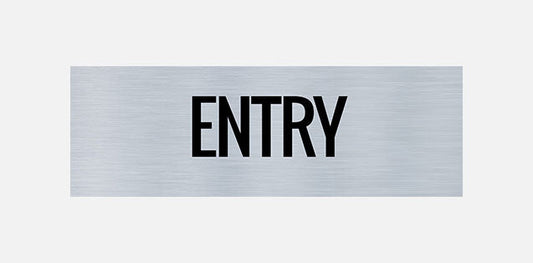 A rectangular metal sign with the word 'ENTRY' printed in capital letters.