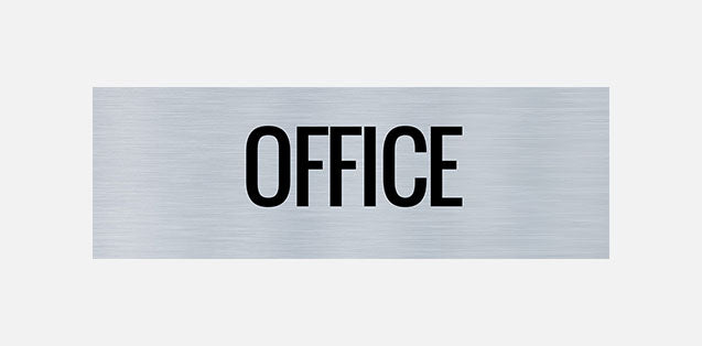 A rectangular metal office door sign with the word 'OFFICE' printed in capital letters