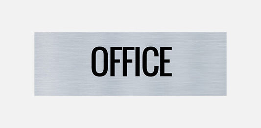 A rectangular metal office door sign with the word 'OFFICE' printed in capital letters
