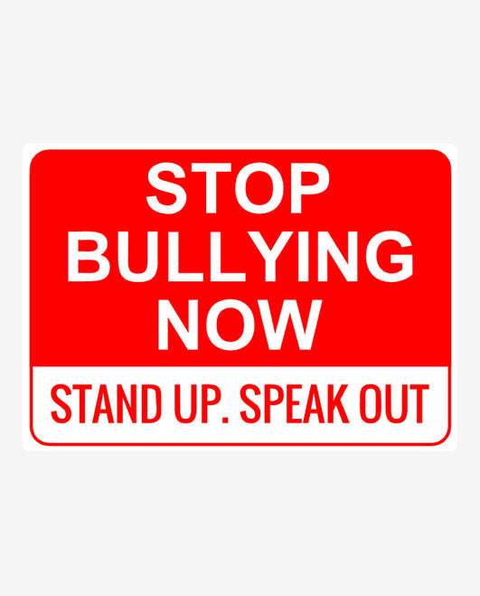 A rectangular sign with a red background and the text 'STOP BULLING NOW' in white capital letters, followed by the phrase 'STAND UP. SPEAK OUT.