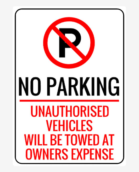 A rectangular parking sign with a white background and red and black text that reads 'NO PARKING UNAUTHORIZED VEHICLES WILL BE TOWED AT THE OWNER'S EXPENSE'.
